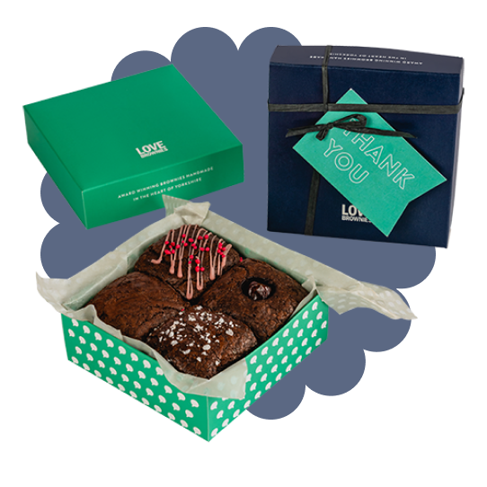 Colourful gift box with handwritten gift tag containing 4 handmade gluten free and nut free chocolate brownies.