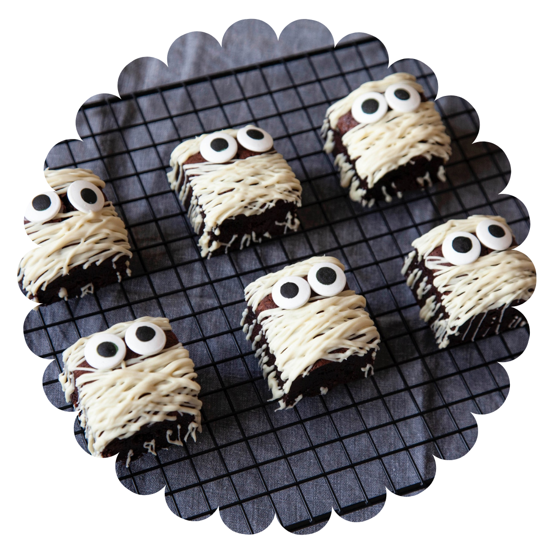 6 halloween decorated double chocolate brownies on a cooling rack. Hand made in Yorkshire