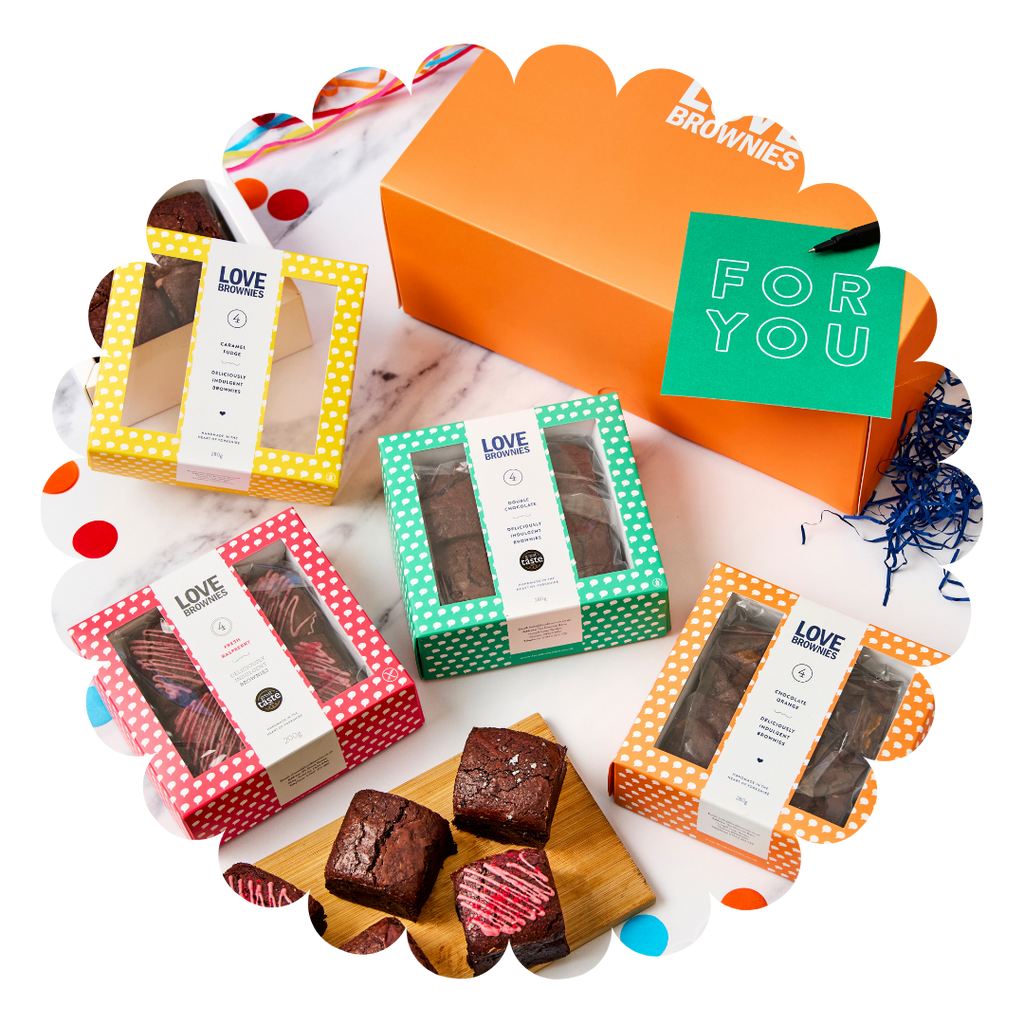 Orange hamper containing 4 colourful boxes of different flavour gluten-free brownies - orange, double chocolate, caramel fudge and raspberry