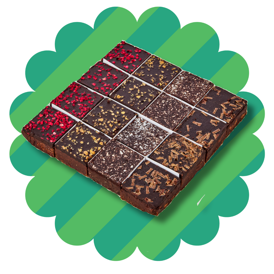 
                  
                    Slab of dairy free, nut free, egg free chocolate brownies. raspberry, coconut, honeycomb and double chocolate flavours
                  
                