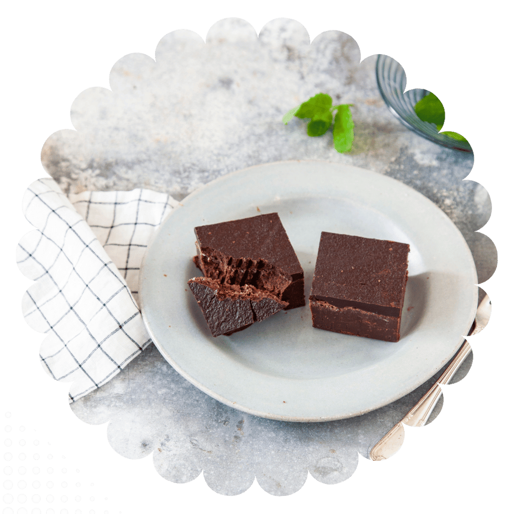 Fudgy vegan brownie with fresh mint oil