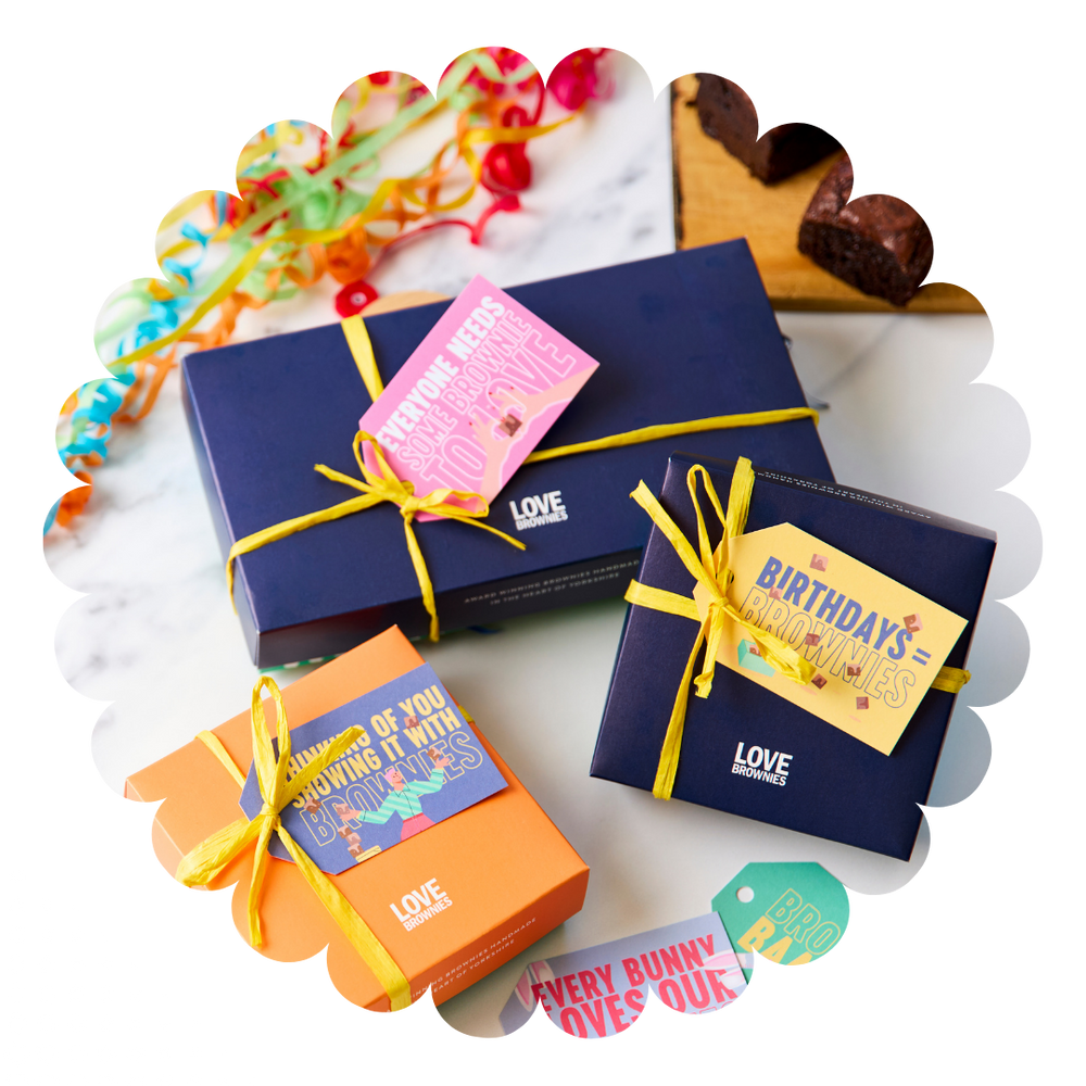 
                  
                    3 colourful boxes of gluten free and nut free handmade chocolate brownies with handwritten personalised notes
                  
                