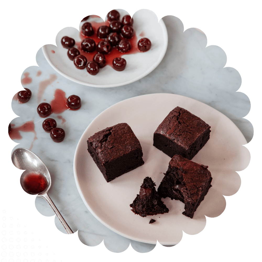 Moist gluten free chocolate brownies with morello cherries soaked in kirsch